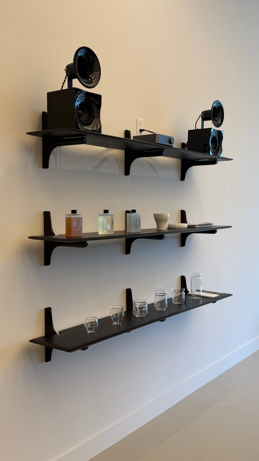 Objects set out on the wall shelves